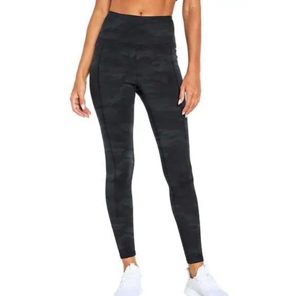 NWT. *Marika Ladies High Rise Tight with Pockets.   Size Small.